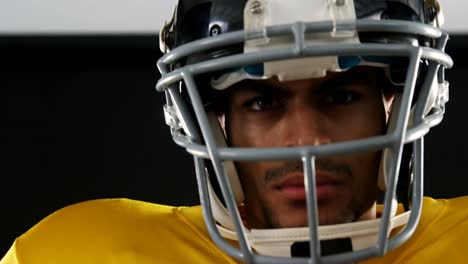 american football player with a head gear 4k