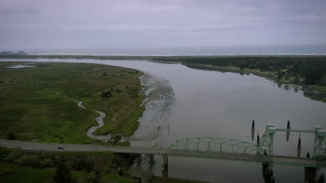 the bullards bridge is a vertical-lift bridge that spans the coquille river near where the river empties into the pacific ocean, just north of bandon, oregon, united states
