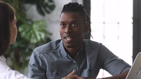 african businessman consultant speak to client inform about offer benefits