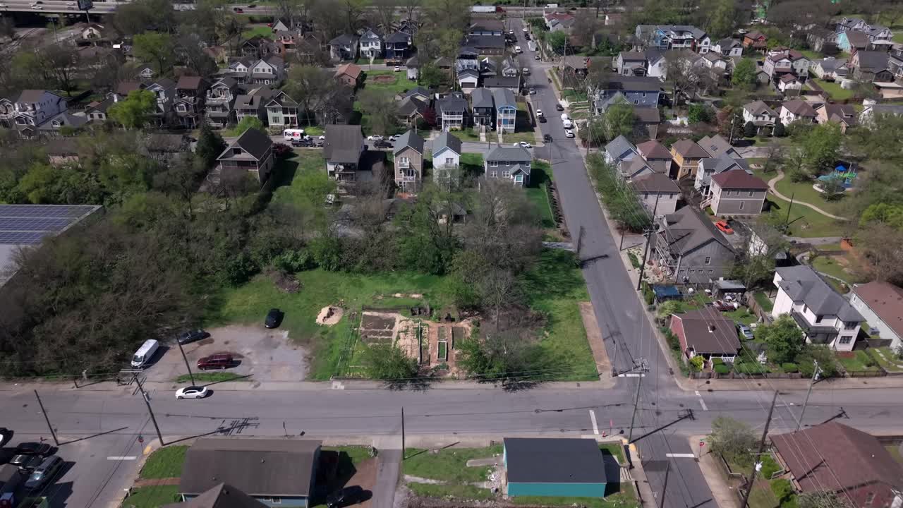 The suburban, residential neighborhood of Germantown in Nashville, Tennessee - forward aerial flyover