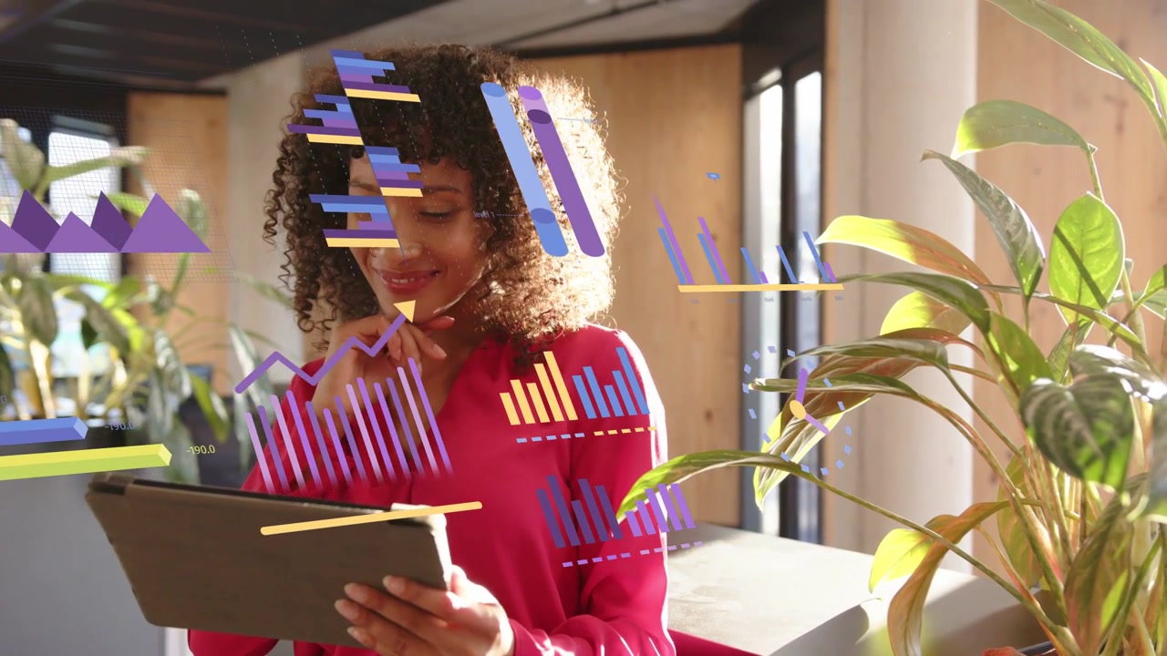 Vertical video: Tapping tablet, woman in red blouse reviewing data graphics at counter and plants