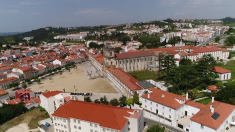 Flying-Over-Alcobaca-Monastery,-Mosteiro-De-Santa-Maria-de-Alcobaça-Portugal