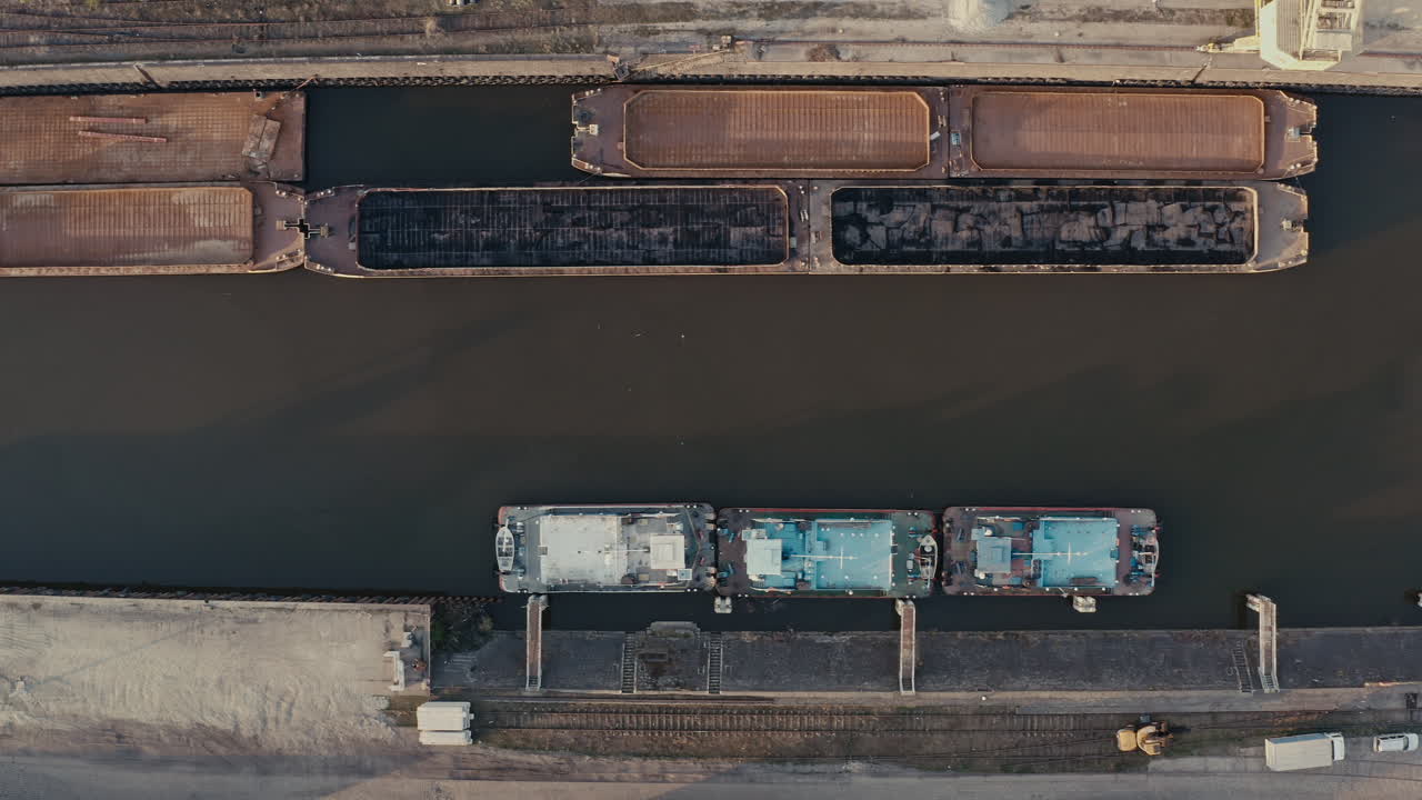 Aerial View of Industrial Port with Barges