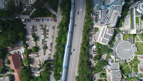 overpassing a city road and buildings