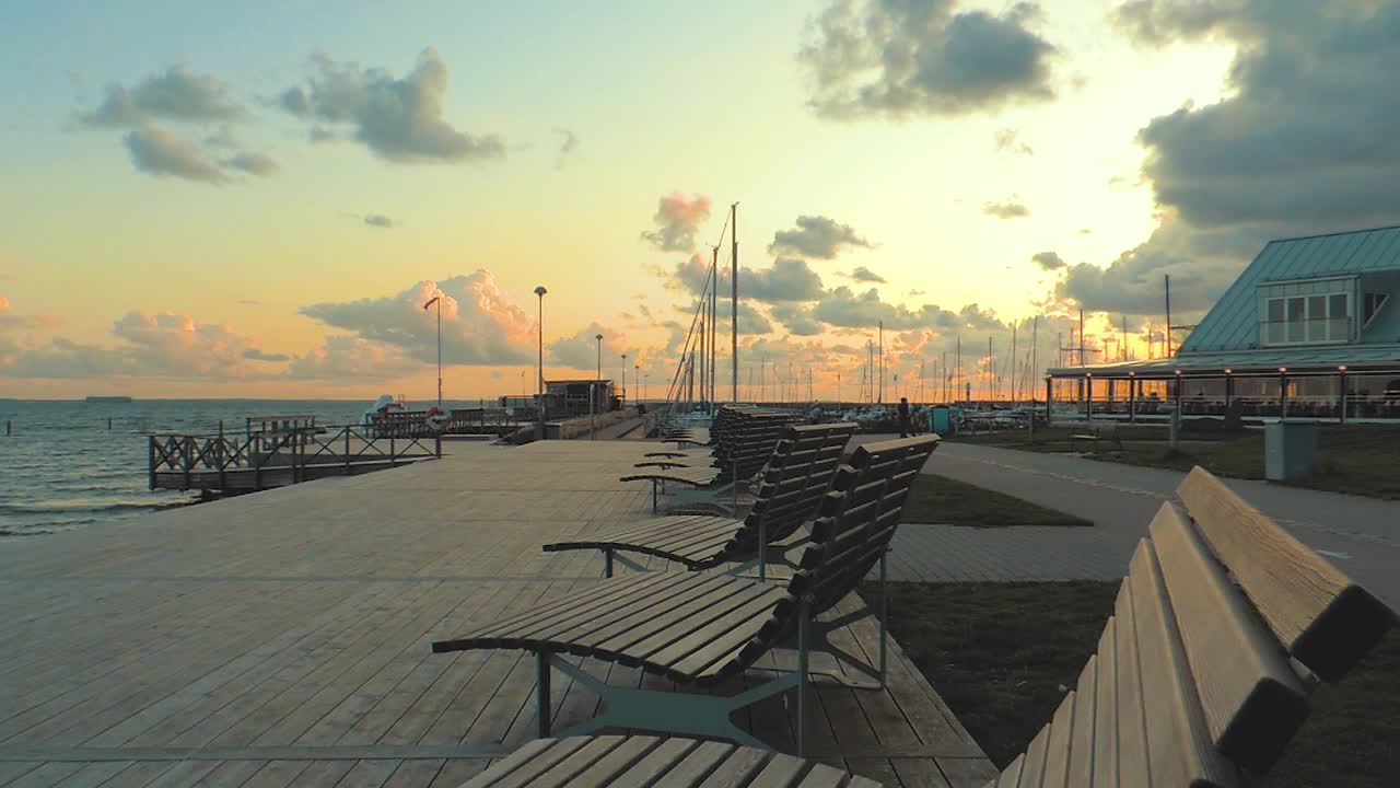 Sunbeds on a bridge by the sea on the coast of Sweden