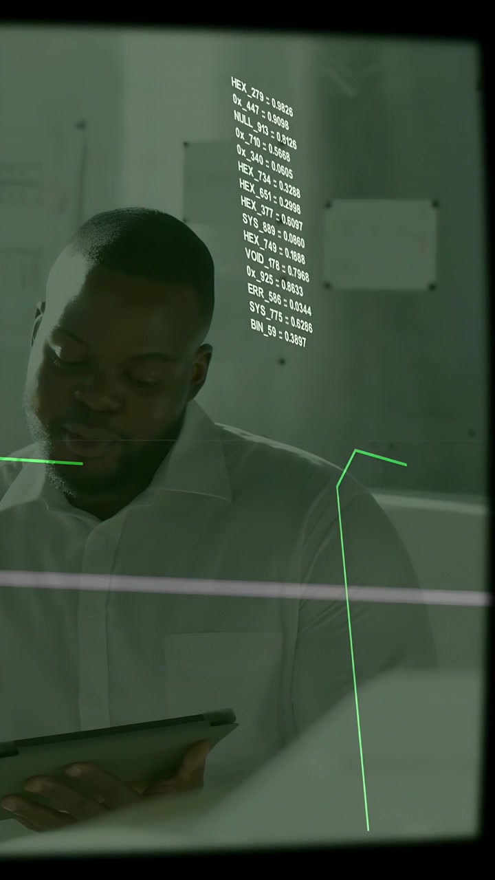 Vertical video: Tech pro tapping tablet glancing up to read, causing HUD data shift and green lines
