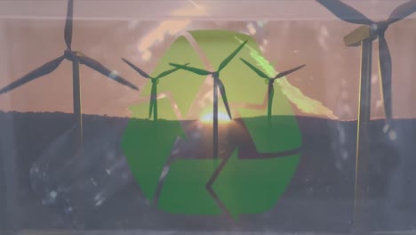 Animation-Eines-Grünen-Recycling-Schildes-über-Einer-Box-Mit-Plastikflaschen-Und-Windturbinen