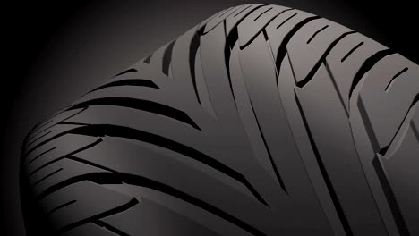 close up on a car tire in motion.