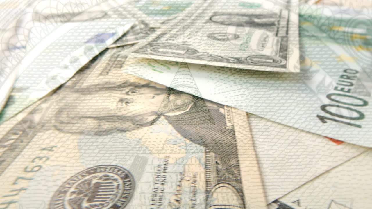 Rotating dollar and euro banknotes of various denominations close-up with a pyramid and the glowing mason eye on top. Pyramid on a banknote of 1 US dollars. 4k macro raw video.