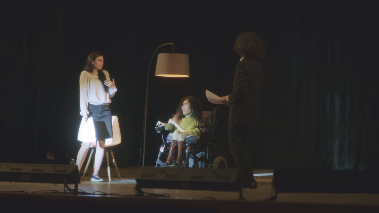 Woman in Wheelchair on Stage