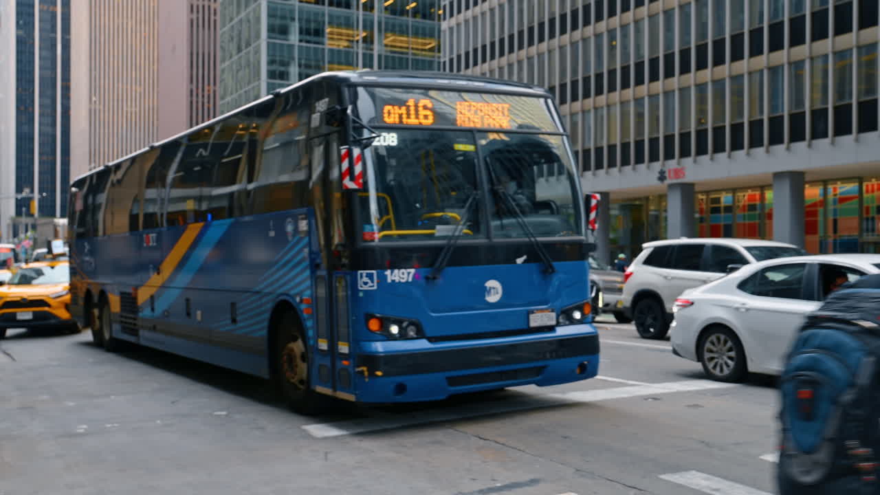 New York, USA, 3 August 2025: Busy New York street with cars and pedestrians in Midtown Manhattan
