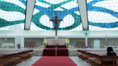 interior of a modern church with stained glass windows