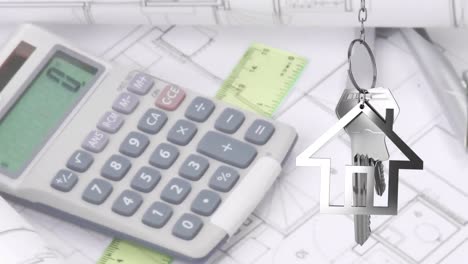 animación de llaves de casa colgadas contra dibujos arquitectónicos giratorios y calculadora