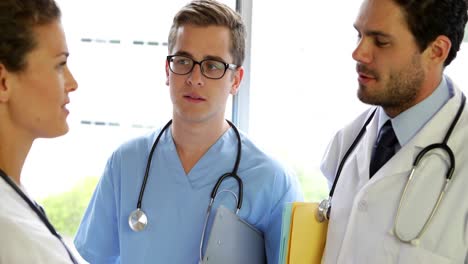 Medical-team-standing-and-chatting