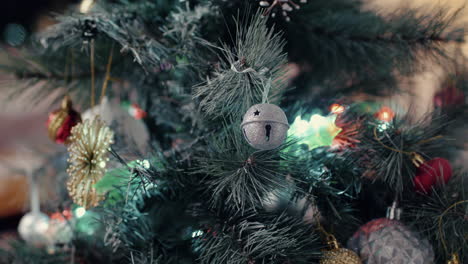 Frosted-Christmas-Tree-With-Glittery-Hanging-Ornaments---Closeup,-Pan-Right