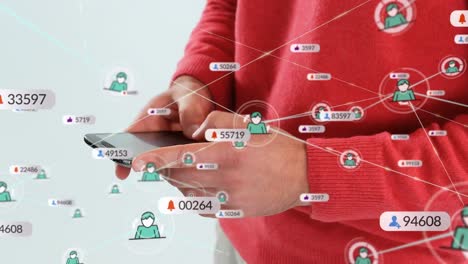 animación de iconos de los medios sobre un empresario caucásico que usa un teléfono inteligente en la oficina