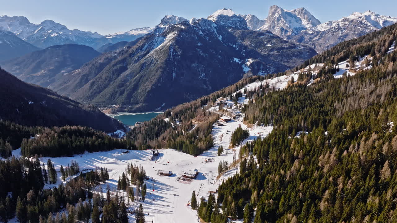 Aerial drone view of a ski resort in Piani di Pezze, Alleghe, Province of Belluno, in the Dolomites, Italy in daylight