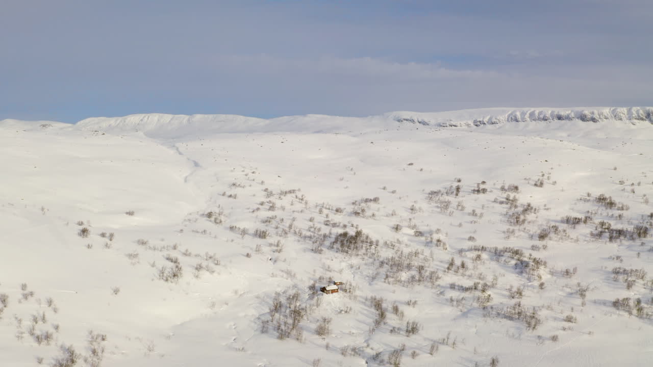 Cabin At Snowy Mountain Of Hardangervidda Near Haugastol In Norway At Winter Season