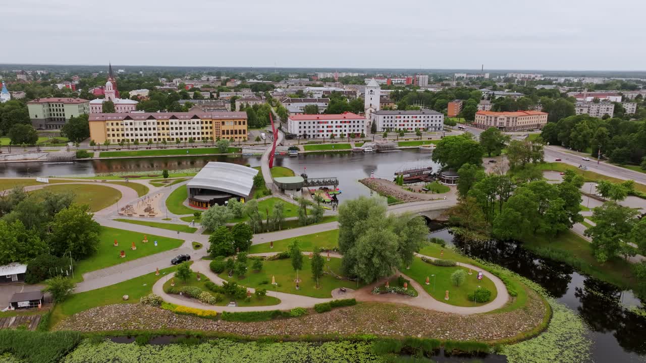 Drone reveals Latvian river island, scenic bridge and urban landscape in Jelgava
