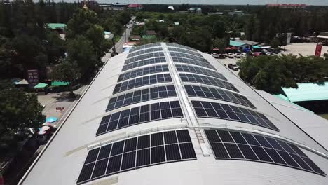 aerial view of solar panels on modern building roof