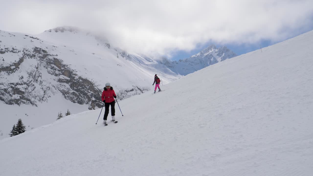 Movement Near The Skiers They Skiing On The Difficulty Mountain Steep Slope