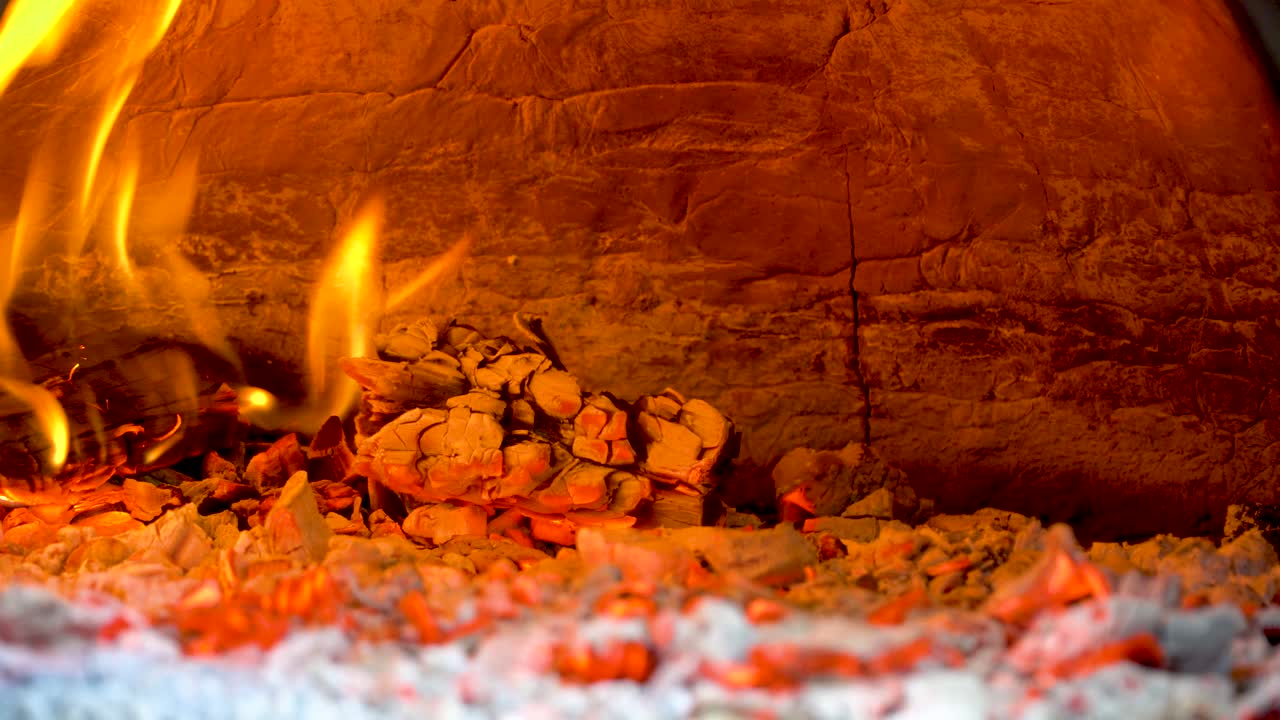 Fire in the wood burning pizza oven