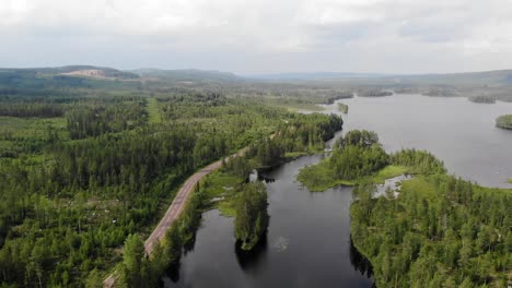 cinematic aerial panoramic view of arctic nature, summer landscape in northern scandinavia wilderness in sweden, movie-like scenery