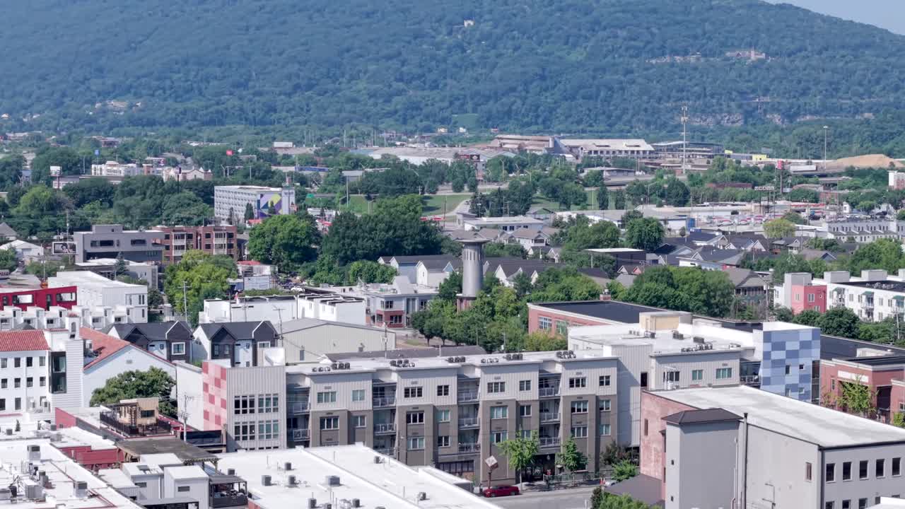Chattanooga, Tennessee business and residential neighborhood in the valley of the Appalachian Mountains - ascending aerial scenic view at daytime