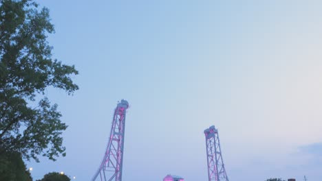 Tilt-down-to-reveal-lift-bridge-lit-up-with-purple-lights