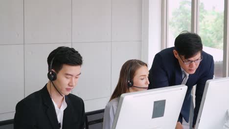 business people wearing headset working in office