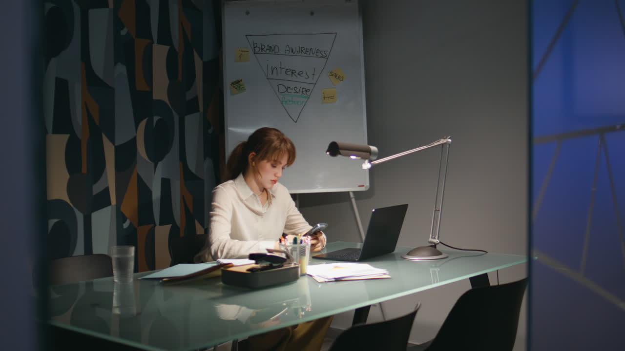 Financial manager texting smartphone night cabinet desk. Employee working late