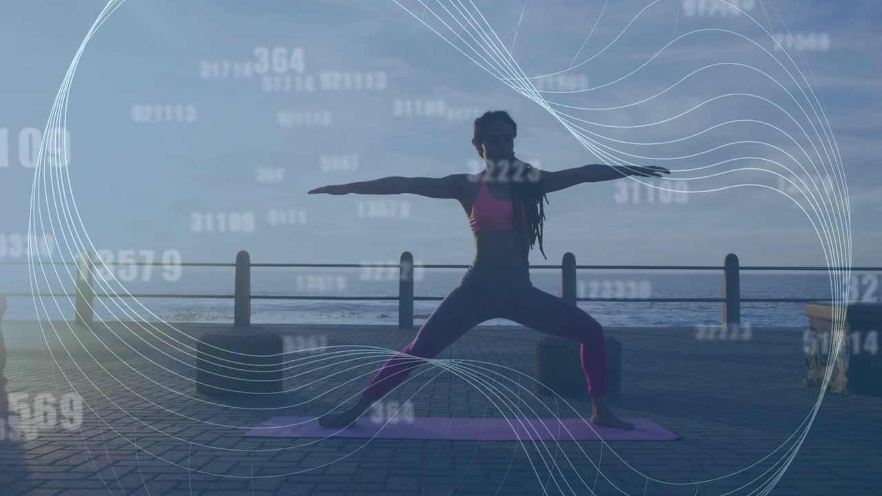Yogi on mat sea promenade starting wide stance shifting legs for balance waves and data overlaying