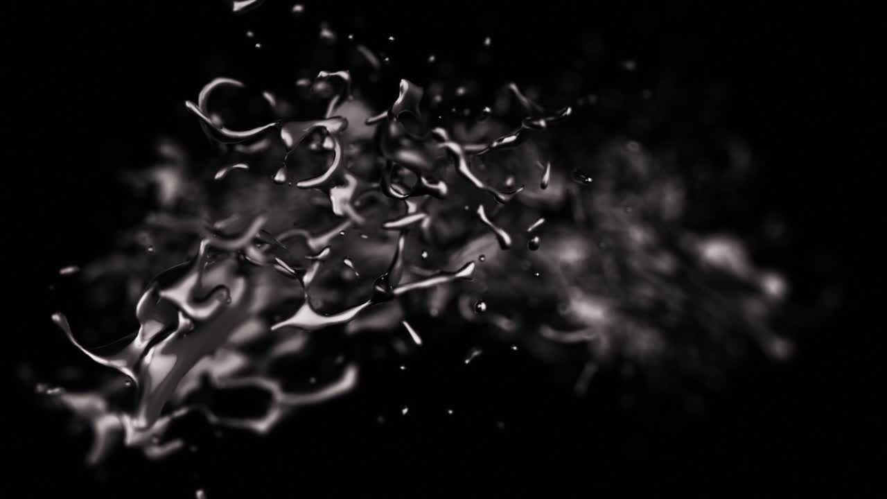 검은 배경에 물이 튀다