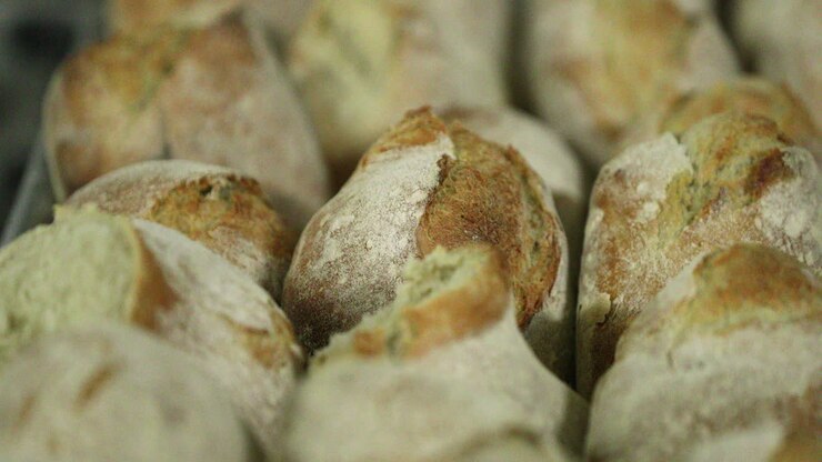 Freshly Baked Sourdough Bread On A Tray In The Bakery