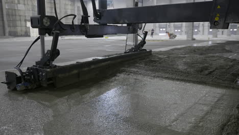 concrete floor pouring operation in a factory