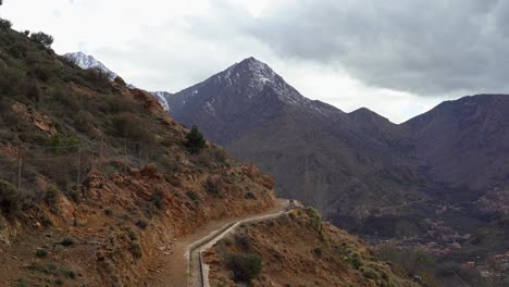 deep blue skies stretch endlessly above toubkal mountain in morocco, unbroken by clouds, enhancing the brilliance of the moroccan mountain landscape