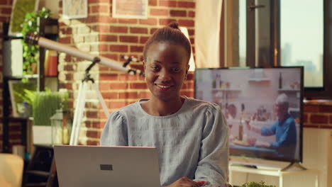 Portrait-of-freelancer-in-warm-lit-room