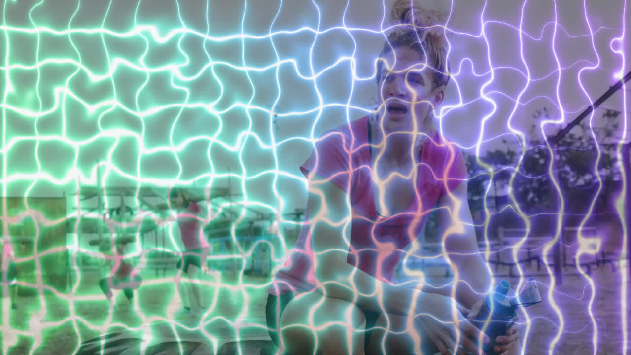 Wearing pink shirt, person with colorful animation overlaying scene in school