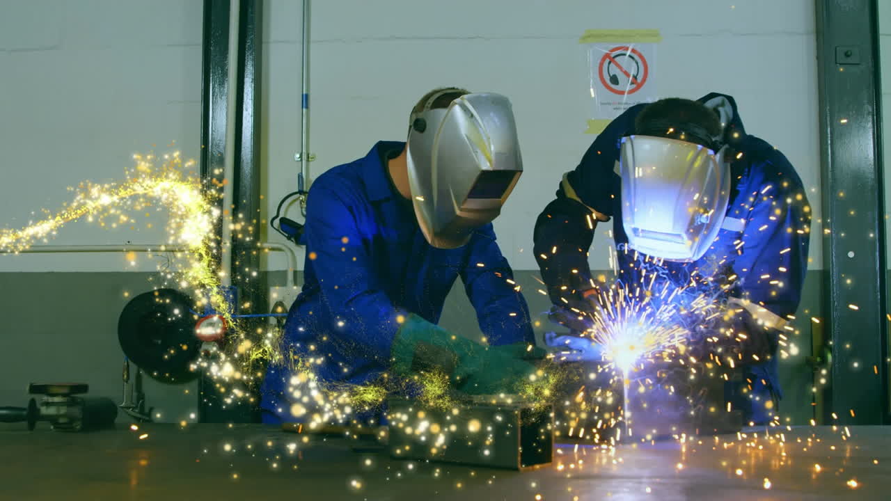 Animation of glowing shooting star over male engineers welding
