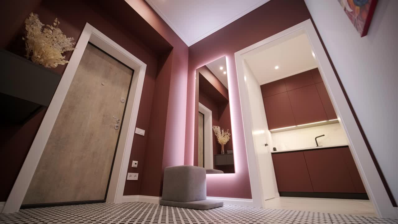 entrada de apartamento rojo moderno con espejo