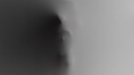 creepy silhouettes of a woman's hands appears from the white surface