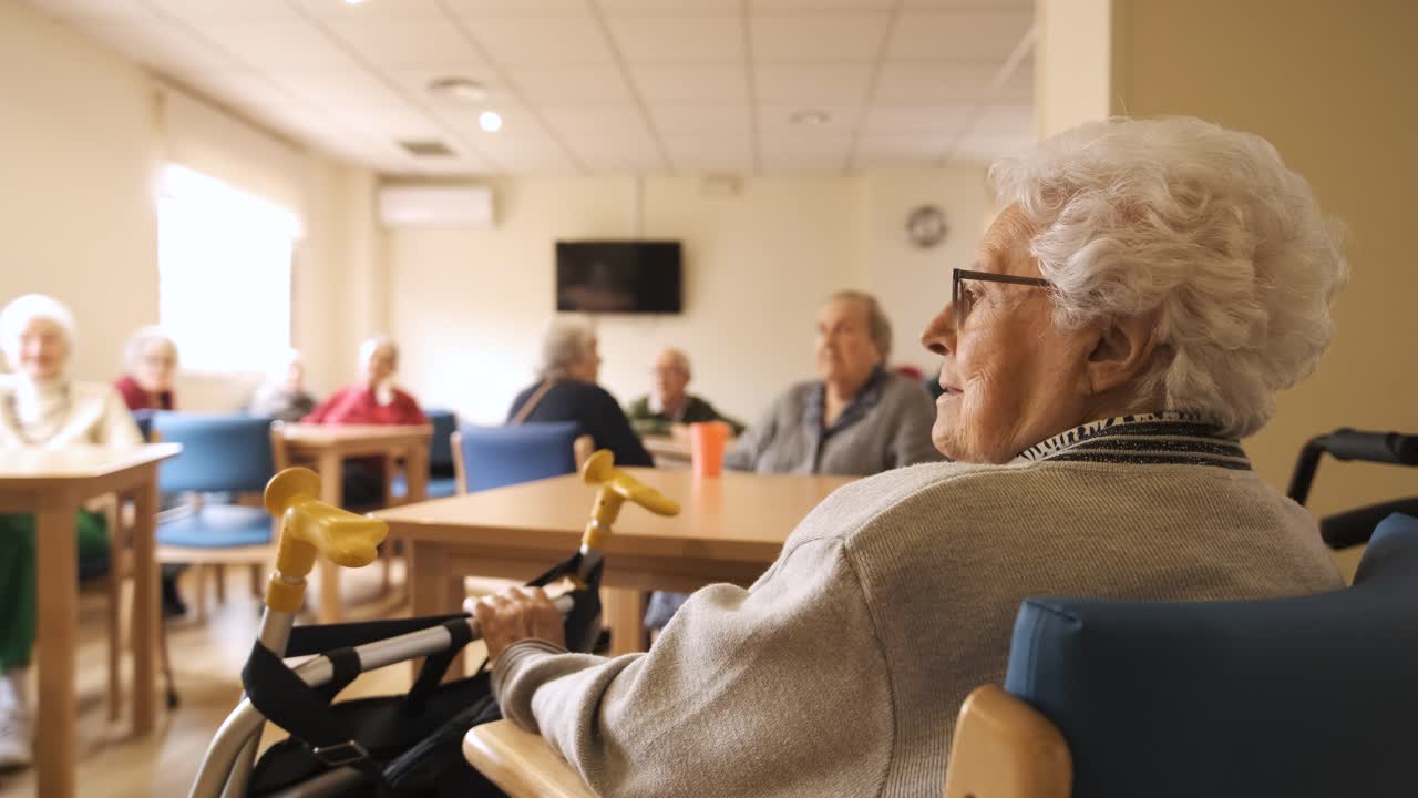 Old people gathering in lounge of retirement home