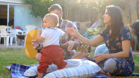 family having fun in the park 4k