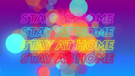animación de las palabras quedarse en casa en rosa, azul, amarillo y rojo en círculos flotantes de varios colores