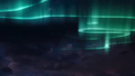 Animation-of-aurora-borealis-glowing-trails-in-blue-and-green-over-clouds-and-sky-at-night