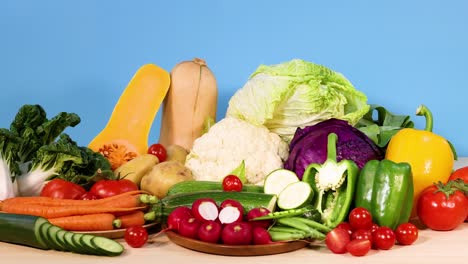 assorted vegetables arranged on a white background