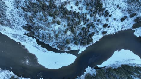 Aerial-Drone-Shot-of-a-Snow-Covered-forest-In-Namsos,-Norway