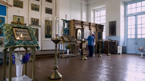 people praying in a historical orthodox church