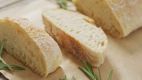 Video-of-rosemary-and-brad-on-baking-paper-on-wooden-worktop