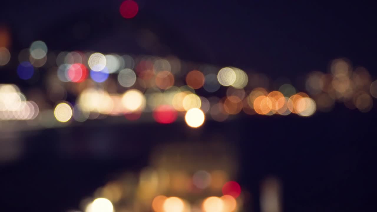 abstract bokeh fondo brillo en la ciudad urbana noche en el centro de la ciudad